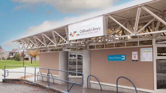 Photo of Chilliwack Library's exterior with a visible sign on the building.