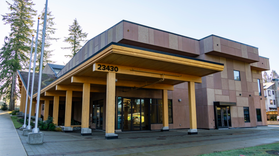 Exterior view of Fort Langley Library at Salishan Place by the river.