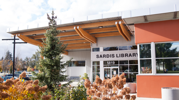 Exterior photo of the Sardis Library, showcasing the modern building and landscape..
