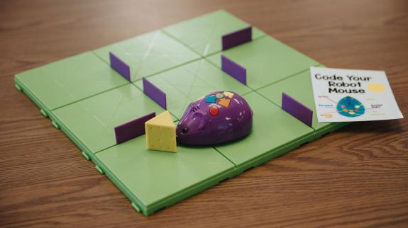 Code & Go Robot Mouse game sitting on table.