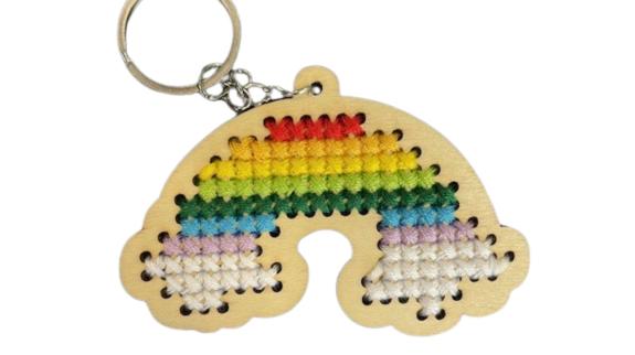 rainbow shaped keychain with colourful cross stitches