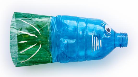 Plastic water bottle upcycled into a fish puppet.