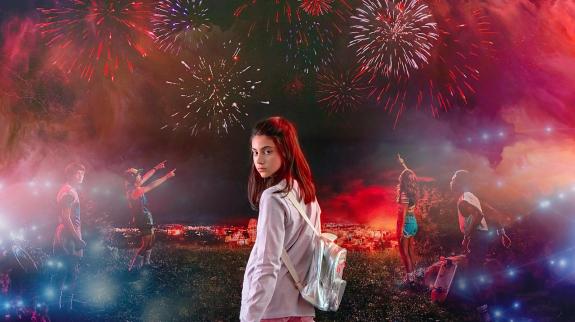 Girl with backpack, and other kids overlook city with fireworks - fantasy theme.