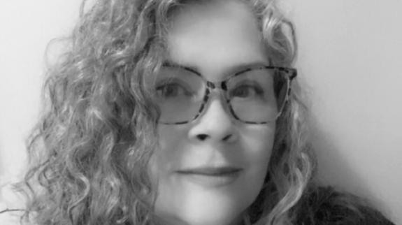 Dr. Leah M. Kelley, MEd, black and white bio pic.