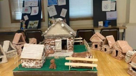 Clay village with creature