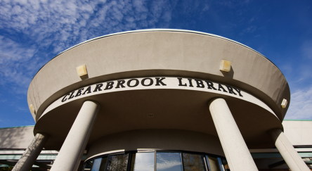Clearbrook Library's front entrance captured in an exterior photo, highlighting its inviting architecture and entryway.