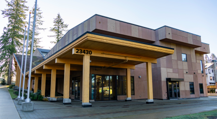 Exterior view of Fort Langley Library at Salishan Place by the river.