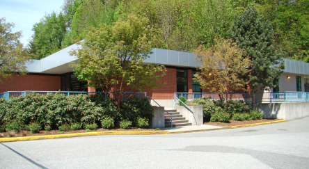Exterior photo of Mission Library against a clear blue sky.