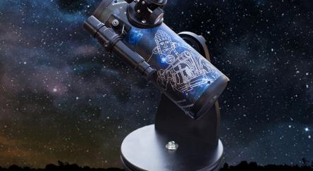 A telescope pointed towards a starry sky, showcasing countless stars and celestial wonders in the background.