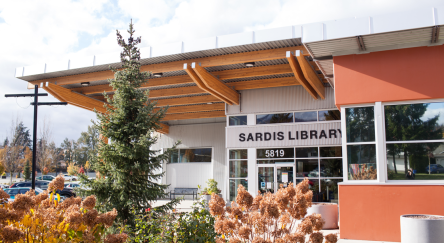 Exterior photo of the Sardis Library, showcasing the modern building and landscape..