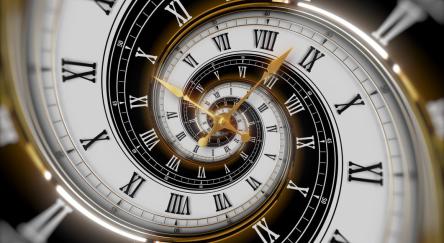 A clock featuring Roman numerals in gold, elegantly designed to enhance any decor with its classic charm.