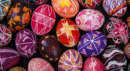 Mix of colored easter eggs with the traditional Pysanky style.