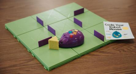 Code & Go Robot Mouse game sitting on table.