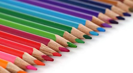 A lineup of coloured pencils.