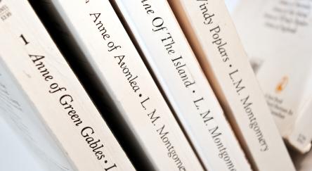 Anne of Green Gables, by Lucy Maud Montgomery first four books of the fictional series are displayed.