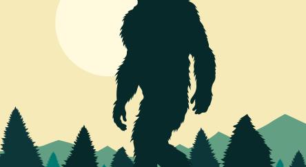 A sasquatch-like figure in a forest setting.