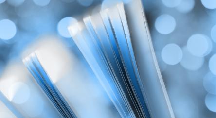 Book pages close-up with bokeh lights