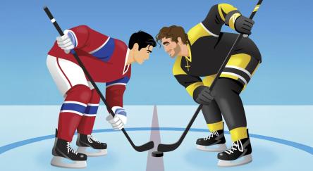 Two male hockey players face off on the ice rink.