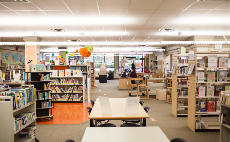 Inside Aldergrove Library, a vast collection of books lines the shelves, inviting visitors to explore and read.