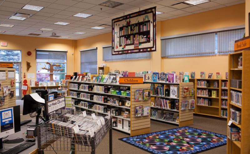 Soft carpeted floor in Hope Library's children's section, designed for comfort and playfulness in a reading space.