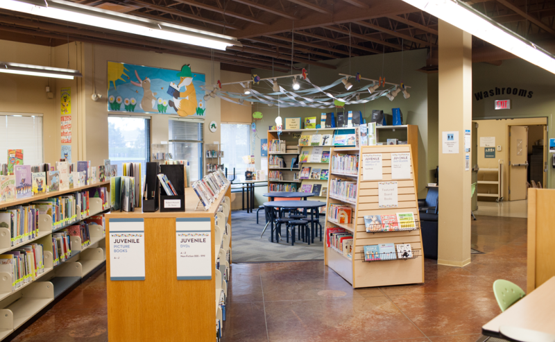 A view of the interior of Murrayvile Library, featuring an abundance of books neatly arranged on shelves.