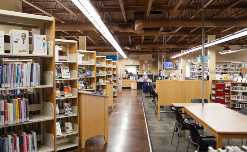 Murrayvile Library's interior showcases rows of books and tables for patrons to read and study comfortably.