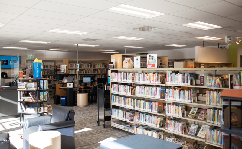A view of Brookswood Library's interior, featuring shelves packed with books, perfect for book lovers and readers alike.