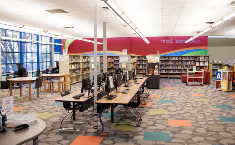 Inside George Mackie Library, a modern space filled with computers and books, perfect for study and research.