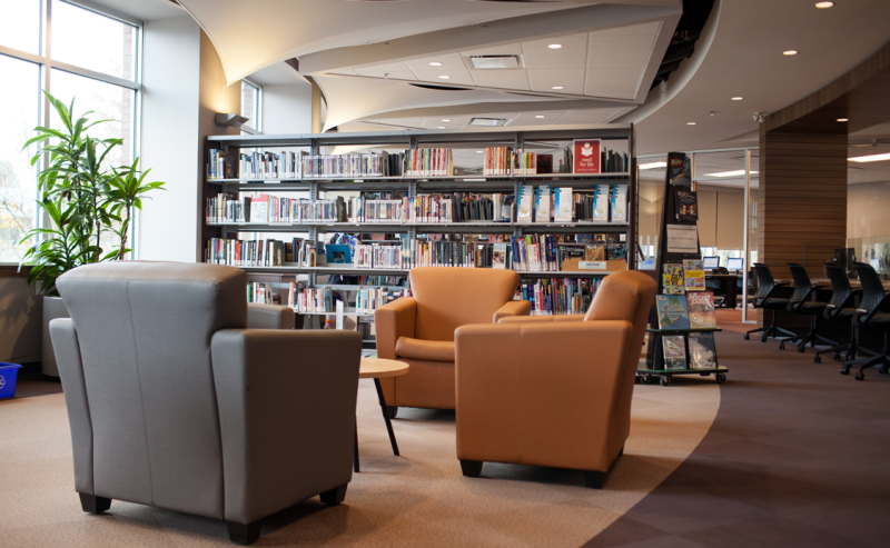 Inside Pitt Meadows Public Library, shelves brimming with books create an inviting environment for readers and learners.