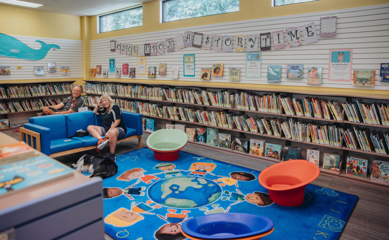 Interior of Mission Library featuring colorful children's books, creating a vibrant and inviting reading space.