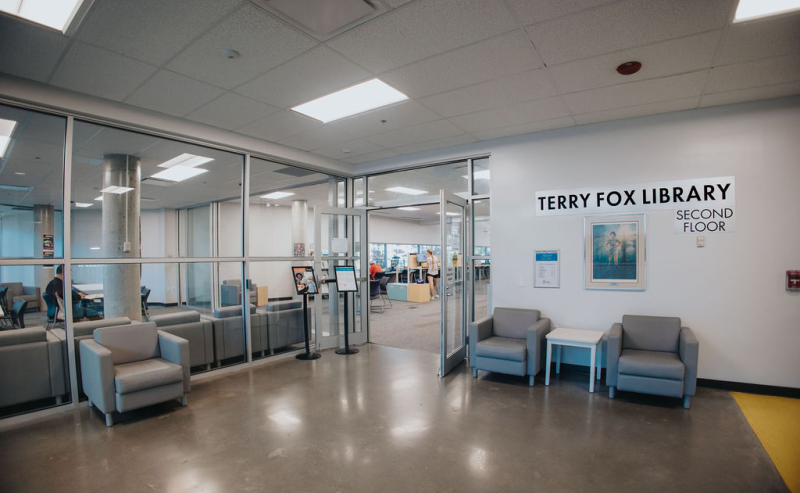 Second-floor entrance of Terry Fox Library, featuring a spacious and inviting interior.