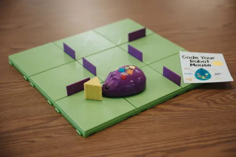 Code & Go Robot Mouse game sitting on table.